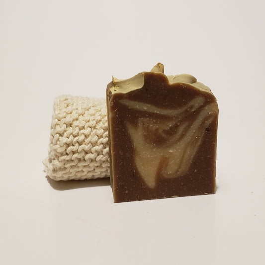 Swirly brown soap next to a cloth